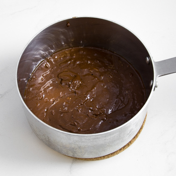 A saucepan of chocolatey barbecue sauce
