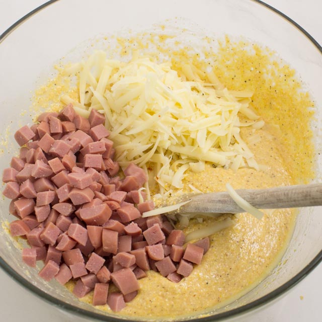 batter with hot dogs