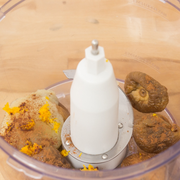 Food processor mixing together figs and the rest of the ingredients.