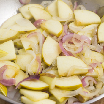 onions with potatoes in frying pan